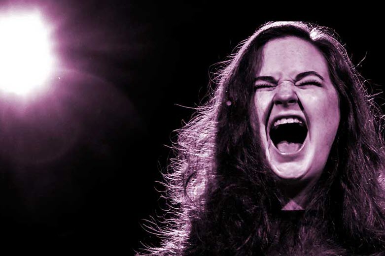 A girl screams during a performance at The Marcelle.