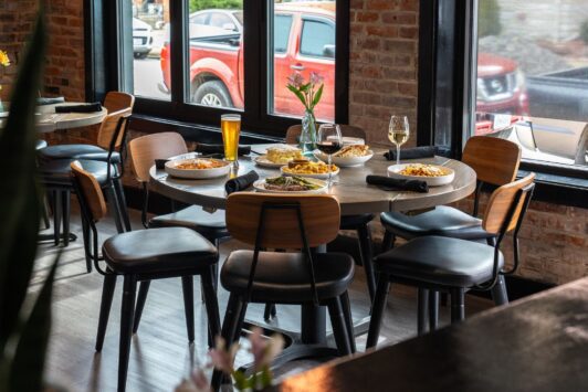 A table is set with upscale Italian cuisine at Marconi Mercato on The Hill in St Louis.