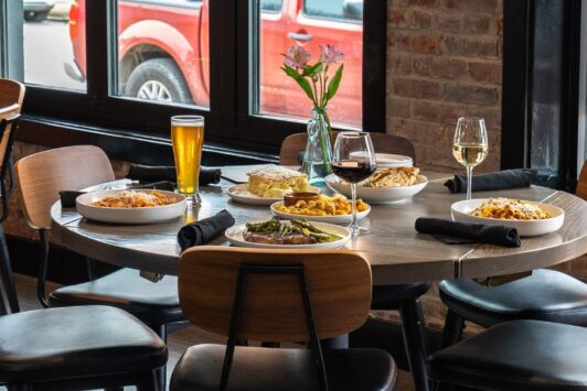 A table is set with upscale Italian cuisine at Marconi Mercato on The Hill in St Louis.